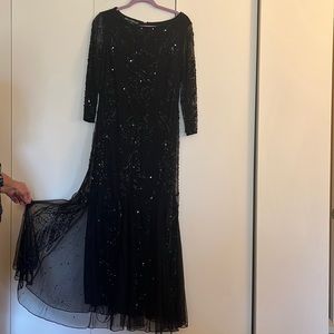 Pisarro Nights evening black dress in size 10 ruffle on the bottom